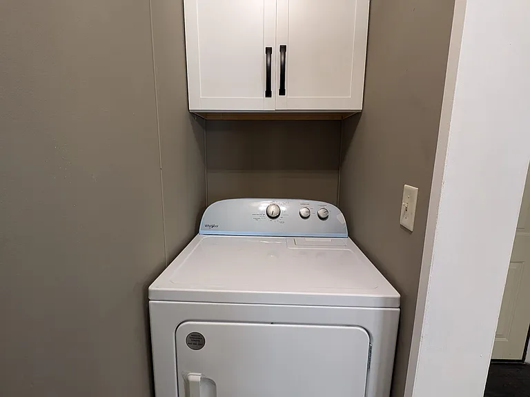 Electric Dryer with shelving abover