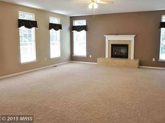Floor to ceiling windows - Gas FP in Family Room