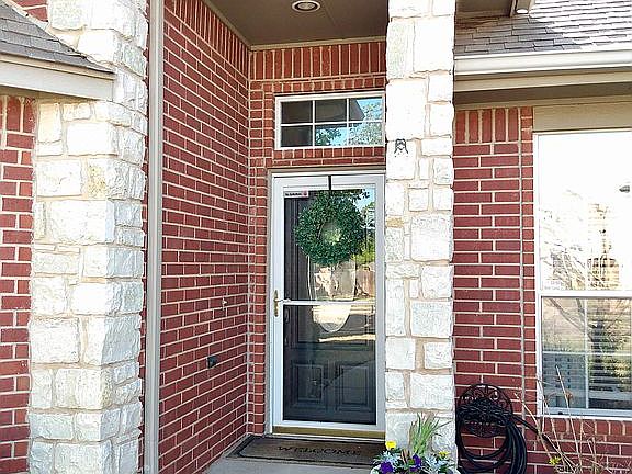 Covered entry w storm door
