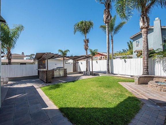 Backyard gas fireplace and BBQ Island