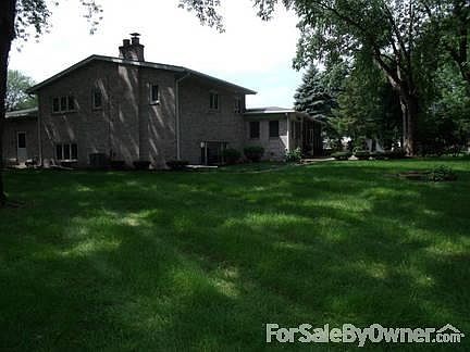 view from extra lot
						:
						Looking north. Mature trees.