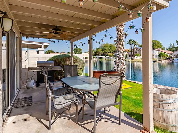 Outdoor dining with lakefront views