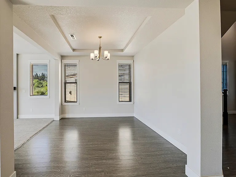 Dining room with vaulted ceiling