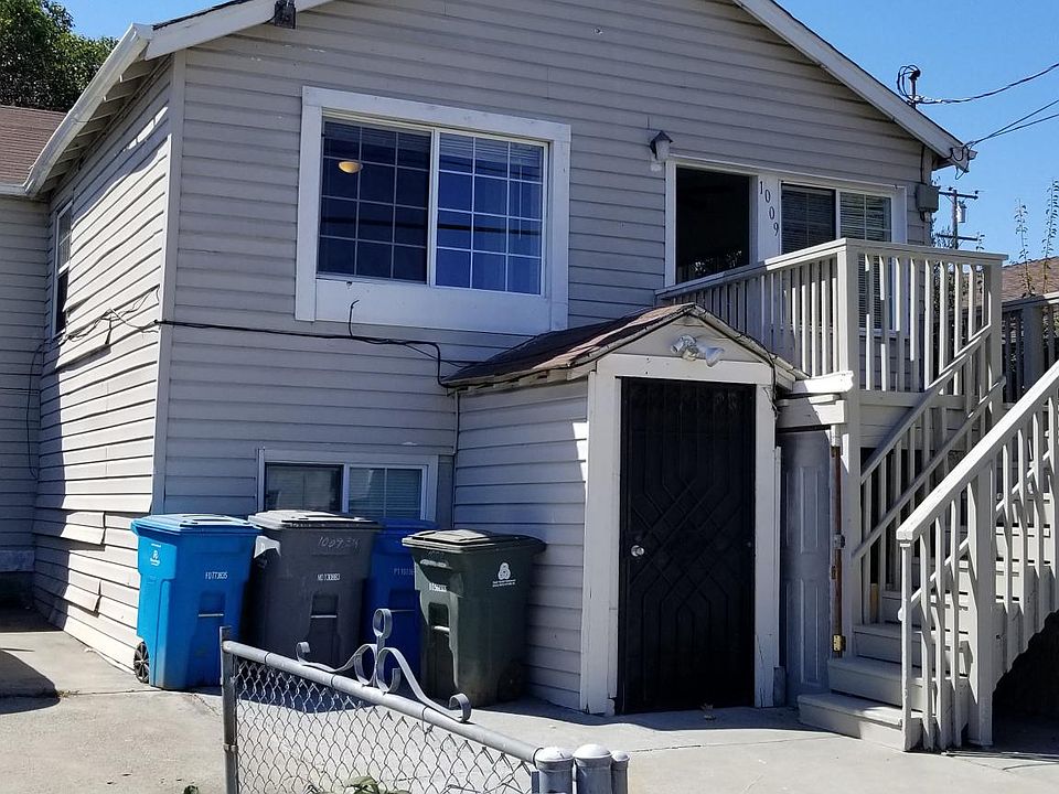Front of the house with gated drive way