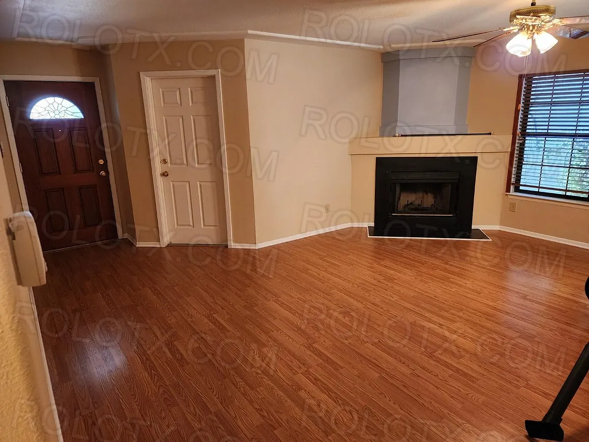 Living Room, wood floor & fireplace - 6855 Cape Meadow Dr