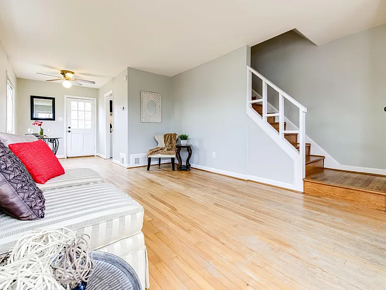 Hardwood floors now stained a darker color