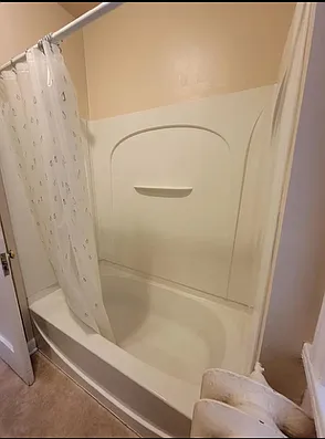 Full bathroom with tub
