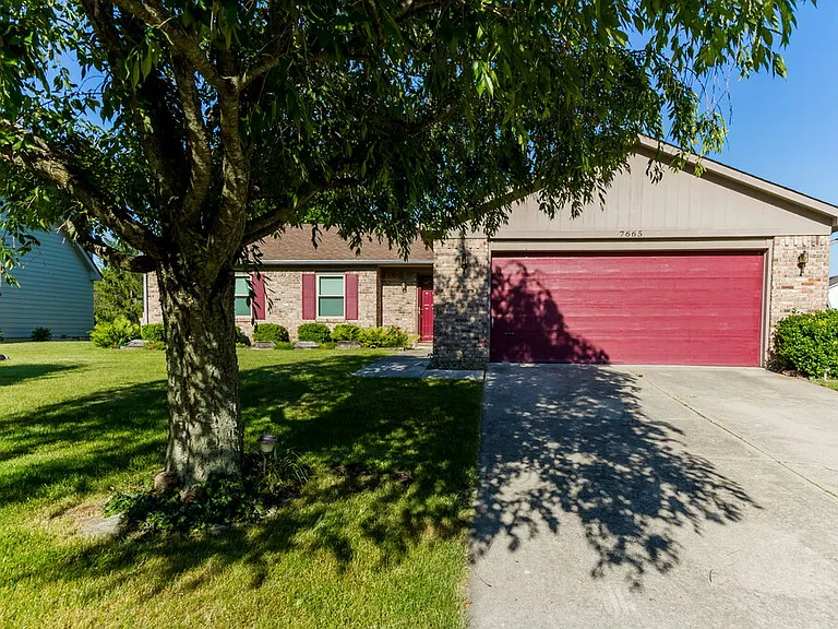 7665 Geist Estates Dr — Photo 1