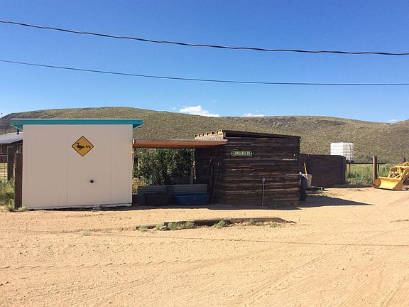 Two 2500 gallon water tanks 