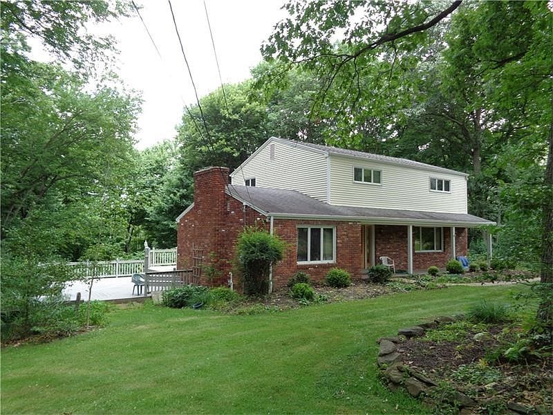 Front side and deck of home.