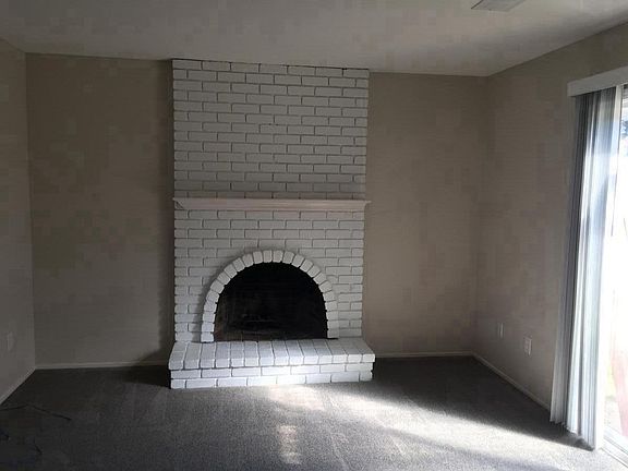 fireplace in family room and slider to back yard