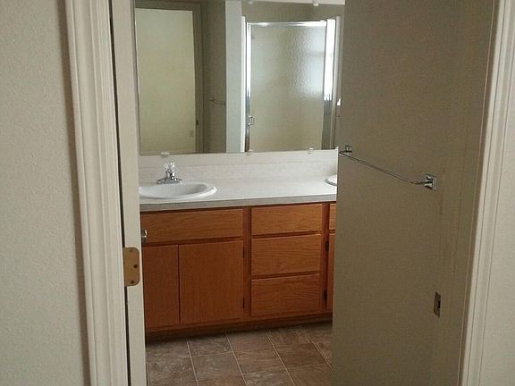 Master bathroom with 2 sinks and shower