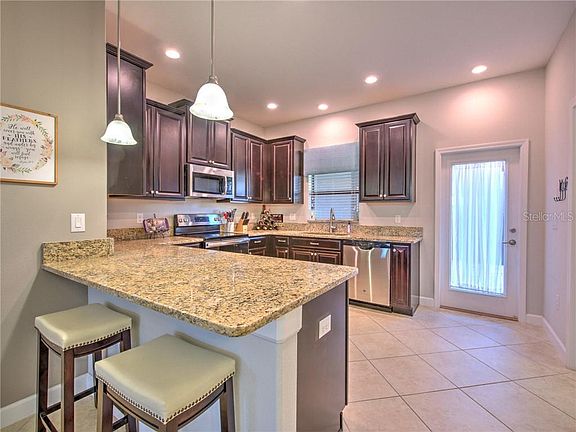5th image of 28593 Tranquil Lake Cir