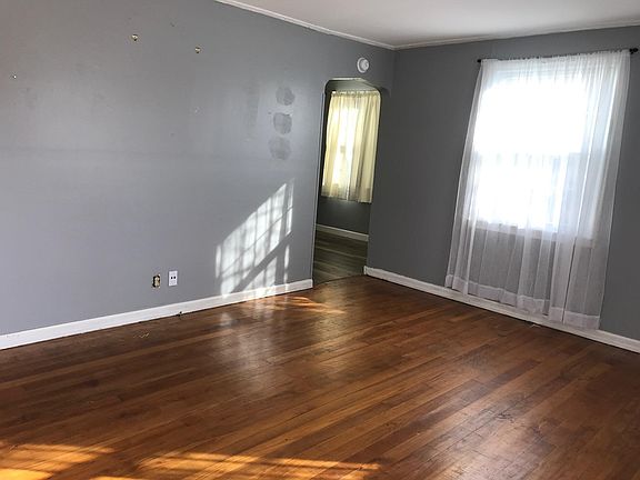 View from living room door into dining area arch