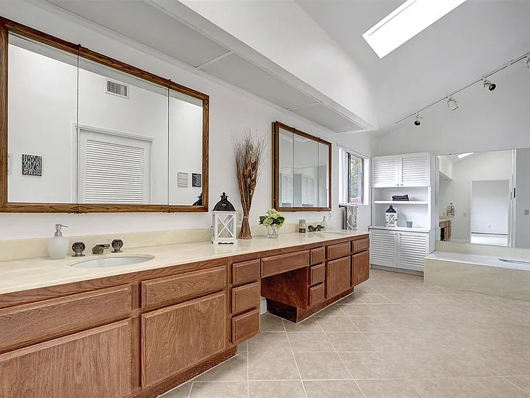 Master Bathroom with Double Vanity, Soaking tub, Private Shower room and toilet