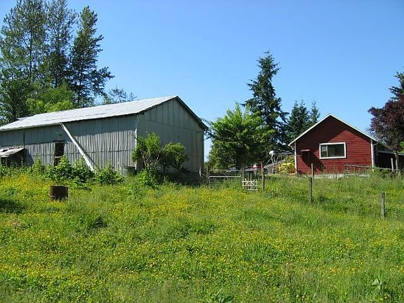 Shop/garage and bonus building from pasture.