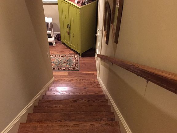 Back stairs to a bed & bath