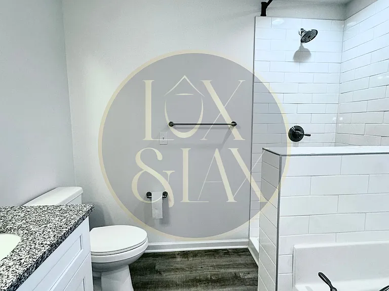 Bedroom 1 | Private Bath features: Double Sinks, Toilet, Stand Alone Shower w/ Large Tub