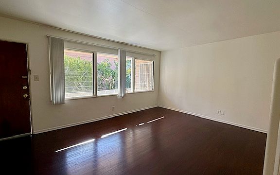 Spacious Living Room w/ Hardwood Floors