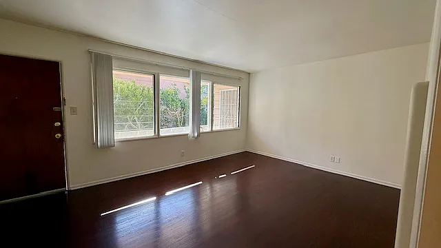 Spacious Living Room w/ Hardwood Floors