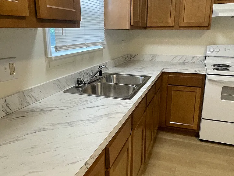 new cabinets, sink, counter tops, appliances