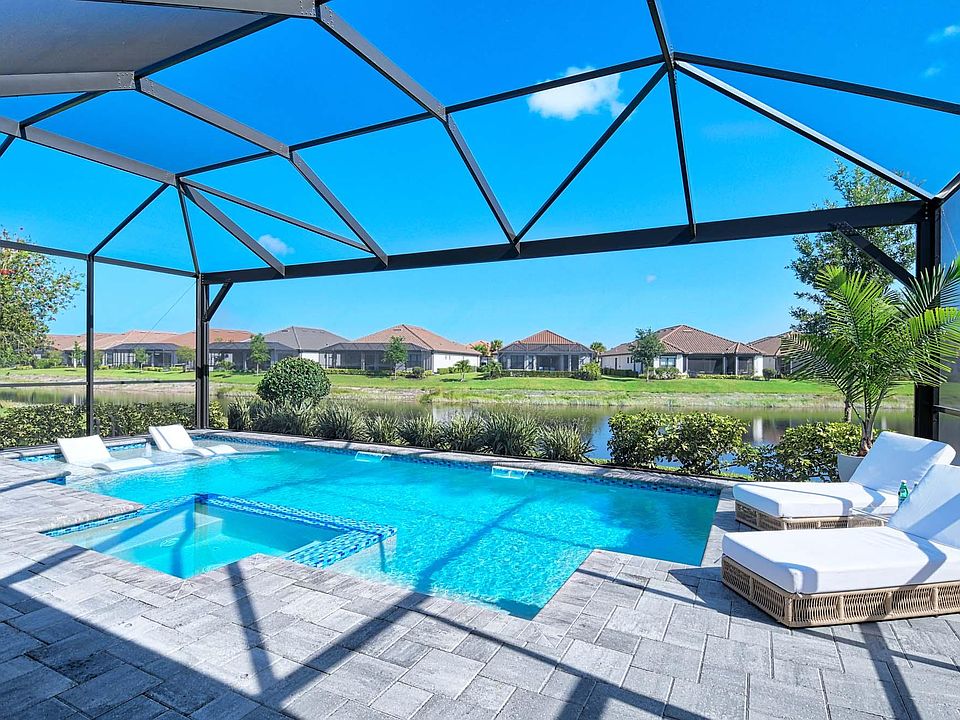 Heated pool and spa overlooking lake