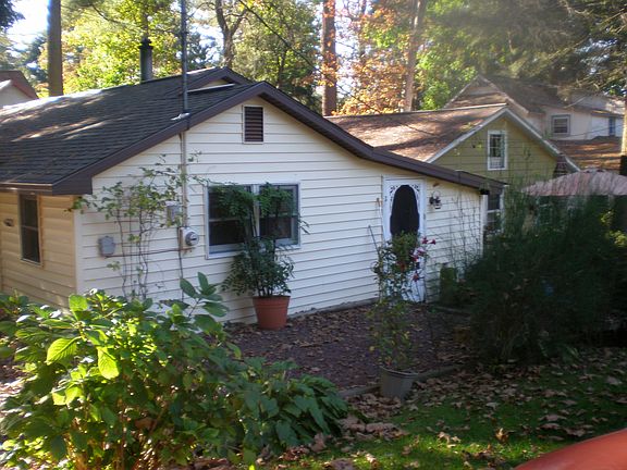 View of Back,patio, parking