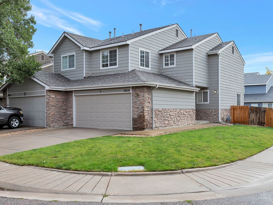 Front of the house with two car garage. Corner lot.