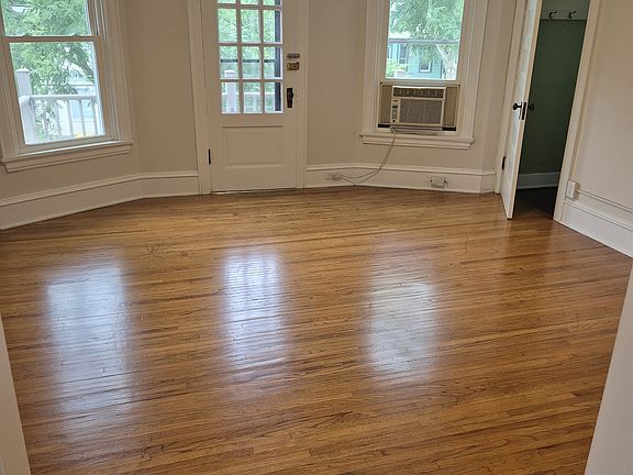 Living Room showing closet and door to second floor porch