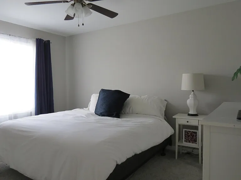 Bedroom 2: Fits a king bed and dresser, walk-in closet
