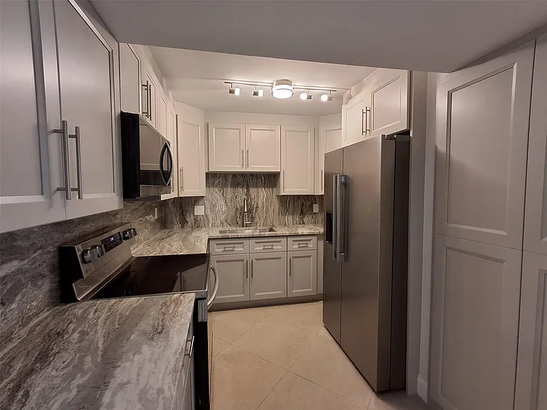 8763 Shadow Wood Blvd #202 — Photo 3