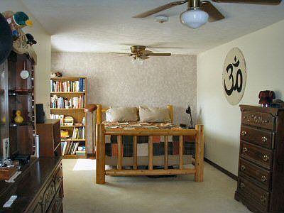 Large Master Bedroom with walk-in closet and full bath. Room measures 25'x15'