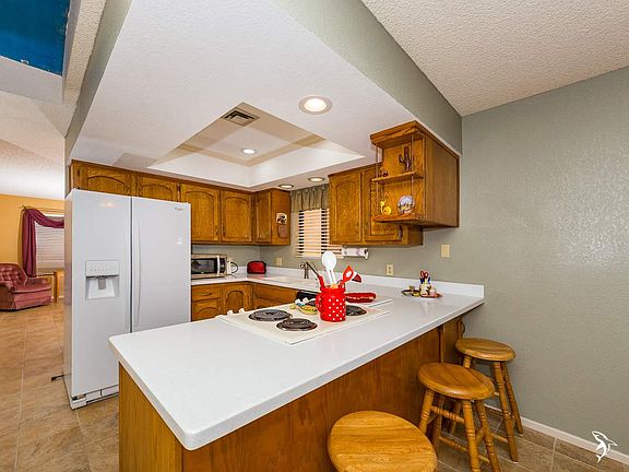 5th image of 11230 E 37th Pl Unit 128