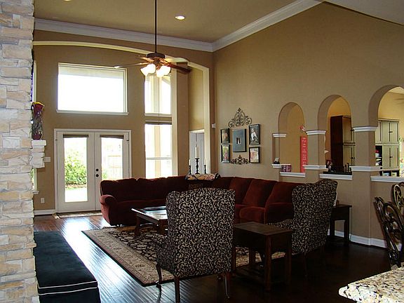 The living space in this home is the very definition of open concept. The living room, kitchen, brea