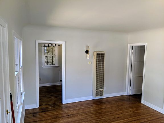 Walked thru front door into Den. Dining room to your left, thru doorway.