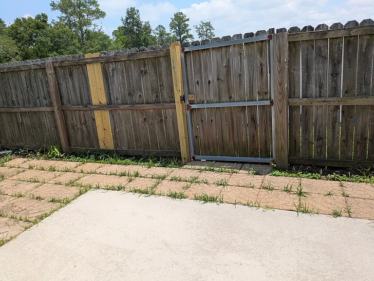 Private fenced backyard