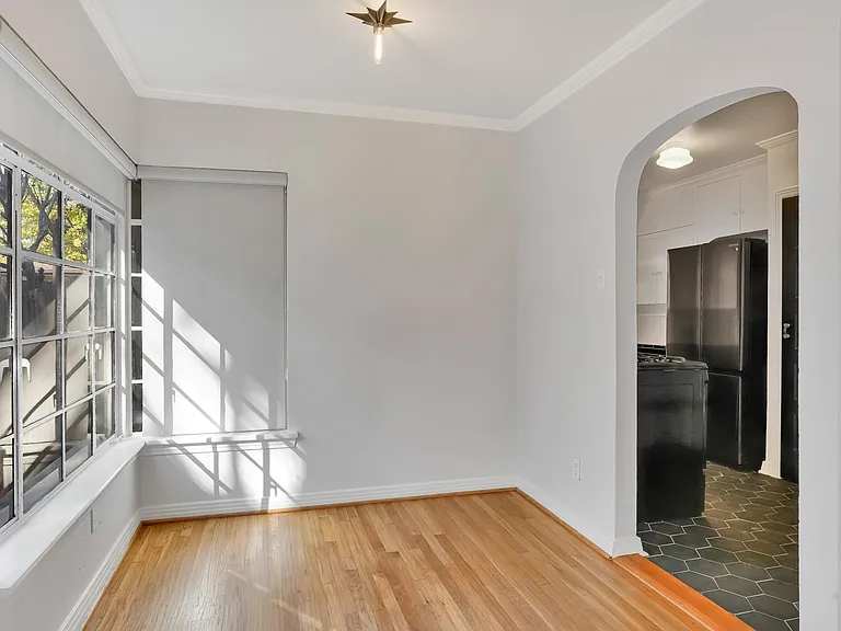 Dining room and adjacent kitchen.