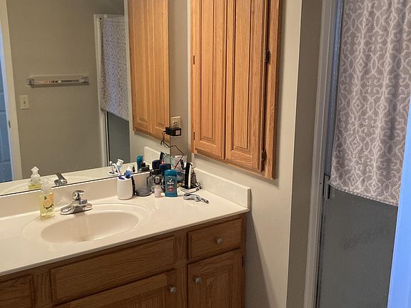 Hall bathroom, also accessible from front bedroom.