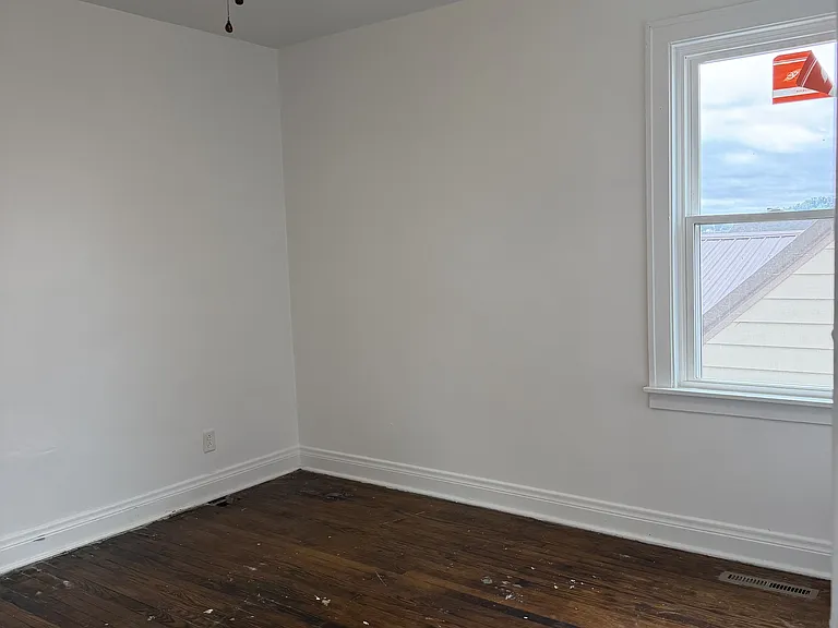 Downstairs back BR - BEFORE hardwood floors refinished