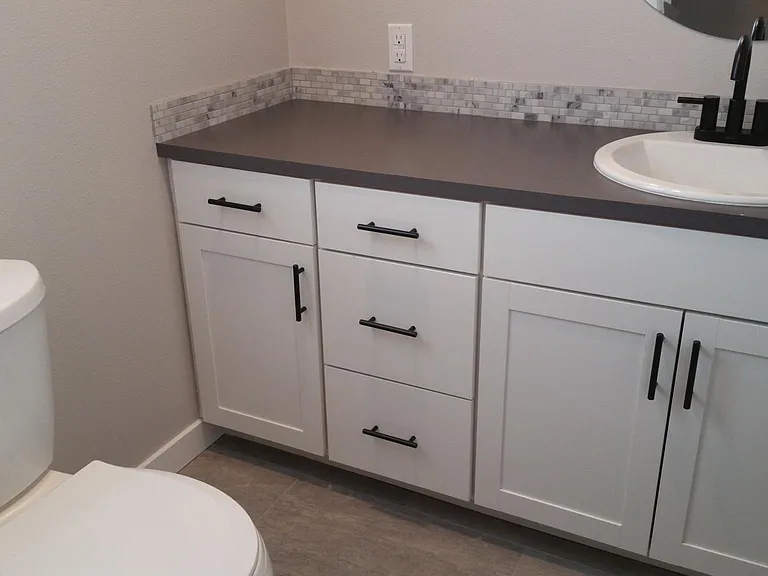Downstairs half bathroom with toilet