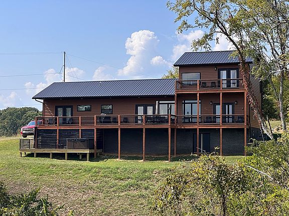Back of house, decks, hottub