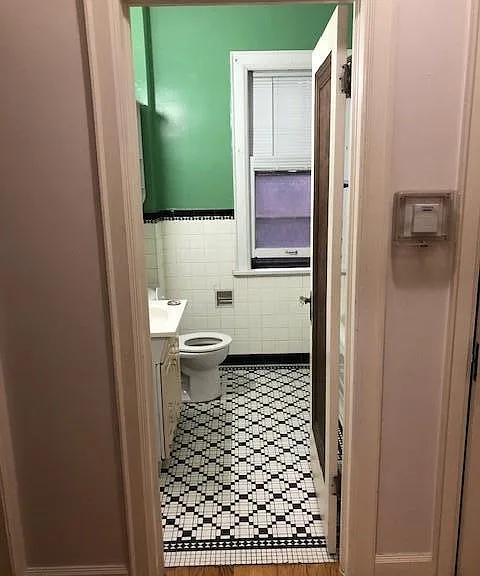 Bathroom entrance. Don't miss the tile floor