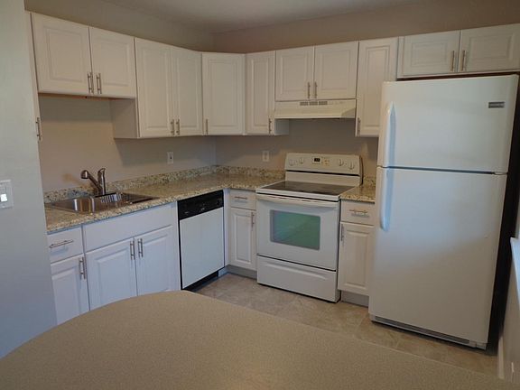 New cabients, countertop, tile, and lighting. Brand new frid