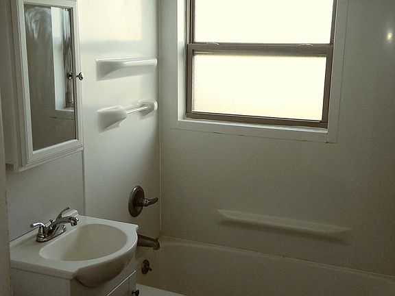 Bathroom. Hall closet not pictured provides ample room for storage.