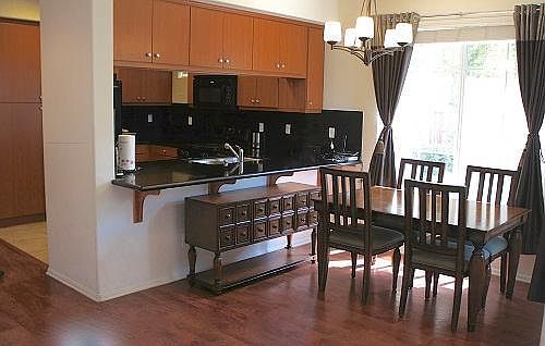 Dining Area (Kitchen visible in the background)