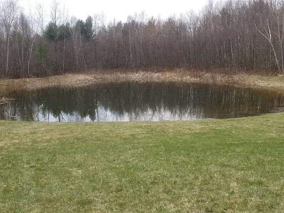 Front View Overlooking Stocked Pond