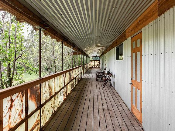covered deck over looks the sculpture garden
