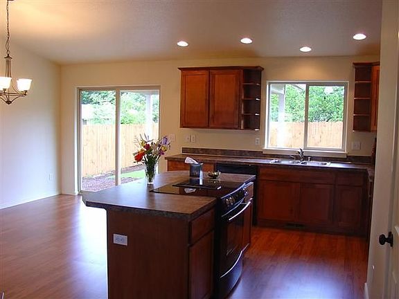 Kitchen with island and laminate