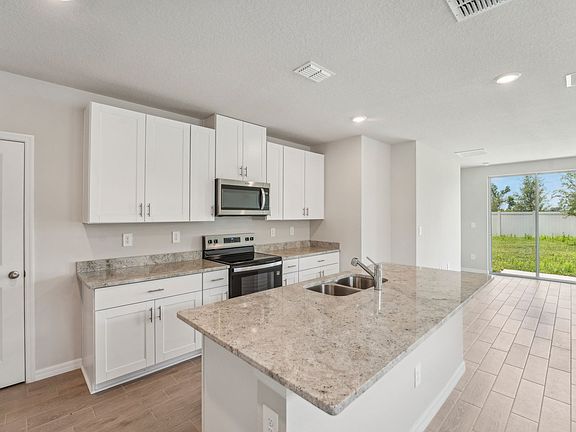 The Yellowstone Floorplan Kitchen at 3921 Radiant Mountain Dr.