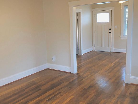 View of front door from dining room